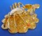 Golden Crab Sitting on Coins